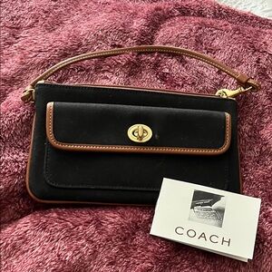 Coach Black and Tan Clutch